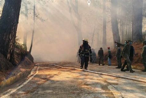 In Baguio City, health alert up as forest fires rage .